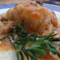 Lomos de bacalao con piñones y pasas.