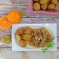 Carne de cerdo con mandarinas y uvas