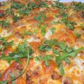 Pizza de carne de canelones, quesos y Rúcala