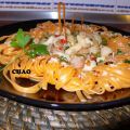 Tagliolini, all arancia con sepia y gambas.