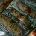 Lomos de sardinas ahumadas en cama de hummus y[...]
