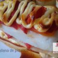 Merluza gratinada  con pimientos de piquillo
