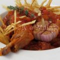 Conejo al ajillo con tomate