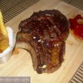 Chuletón de buey con piquillos confitados